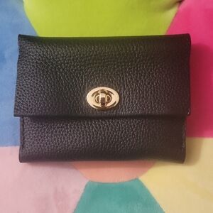 Atelier Alain Elegant Black Leather Clutch